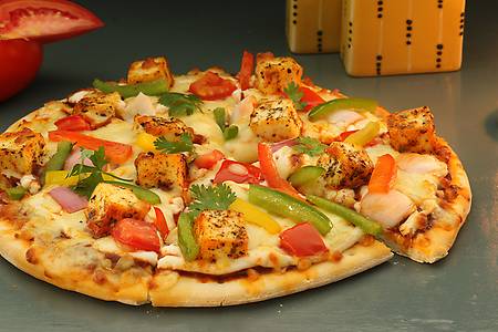 Veggie delight pizza ( Onion, Capsicum, Tomato )